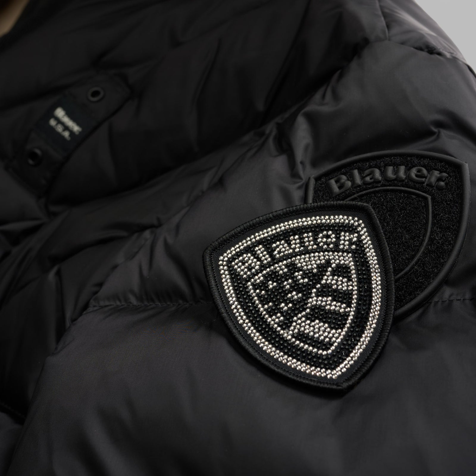 PIUMINO LUNGO A LINEE GEOMETRICHE ALTHEA - NERO