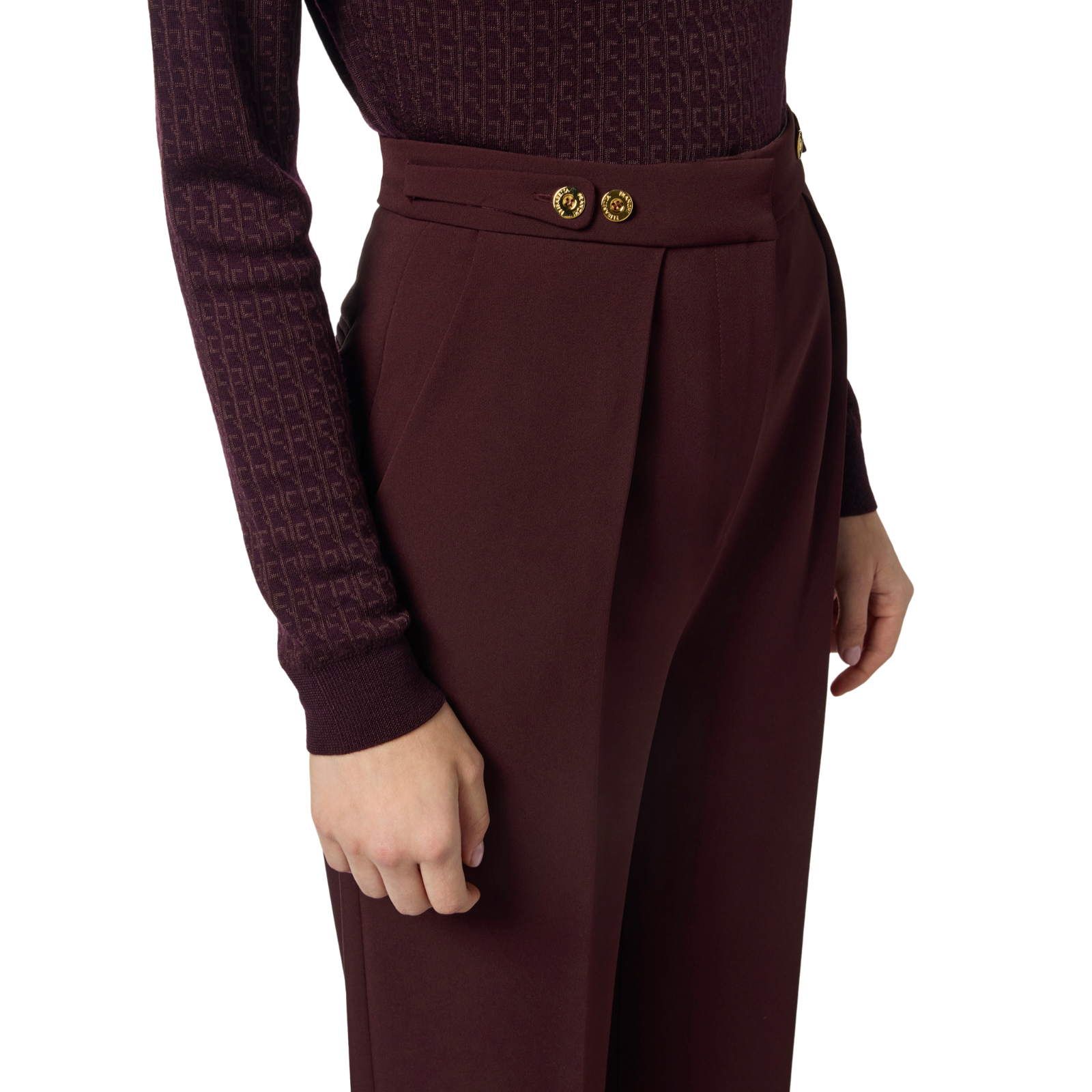 Pantaloni in crêpe con accessorio gioiello