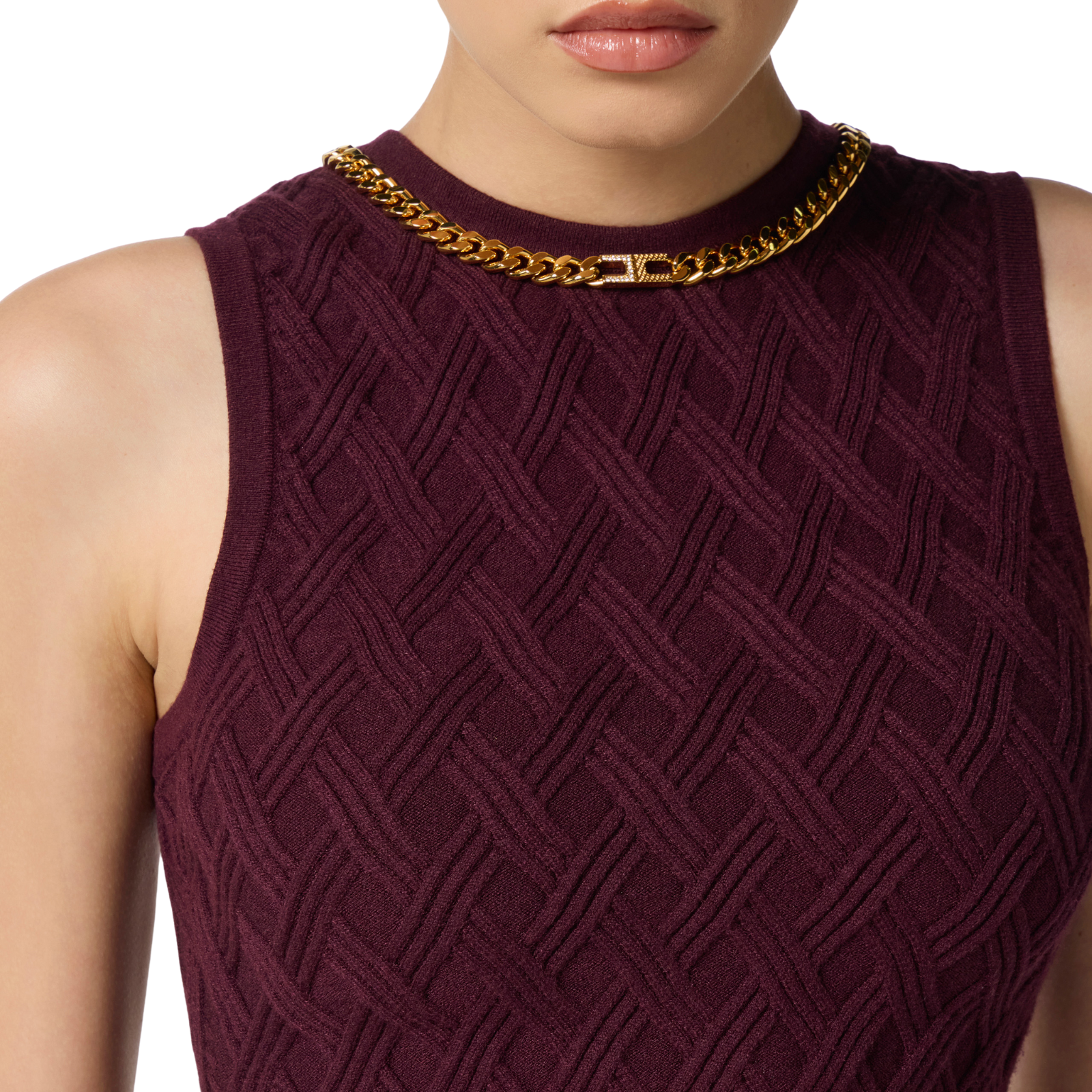 Top in maglia a rombi con dettaglio gioiello