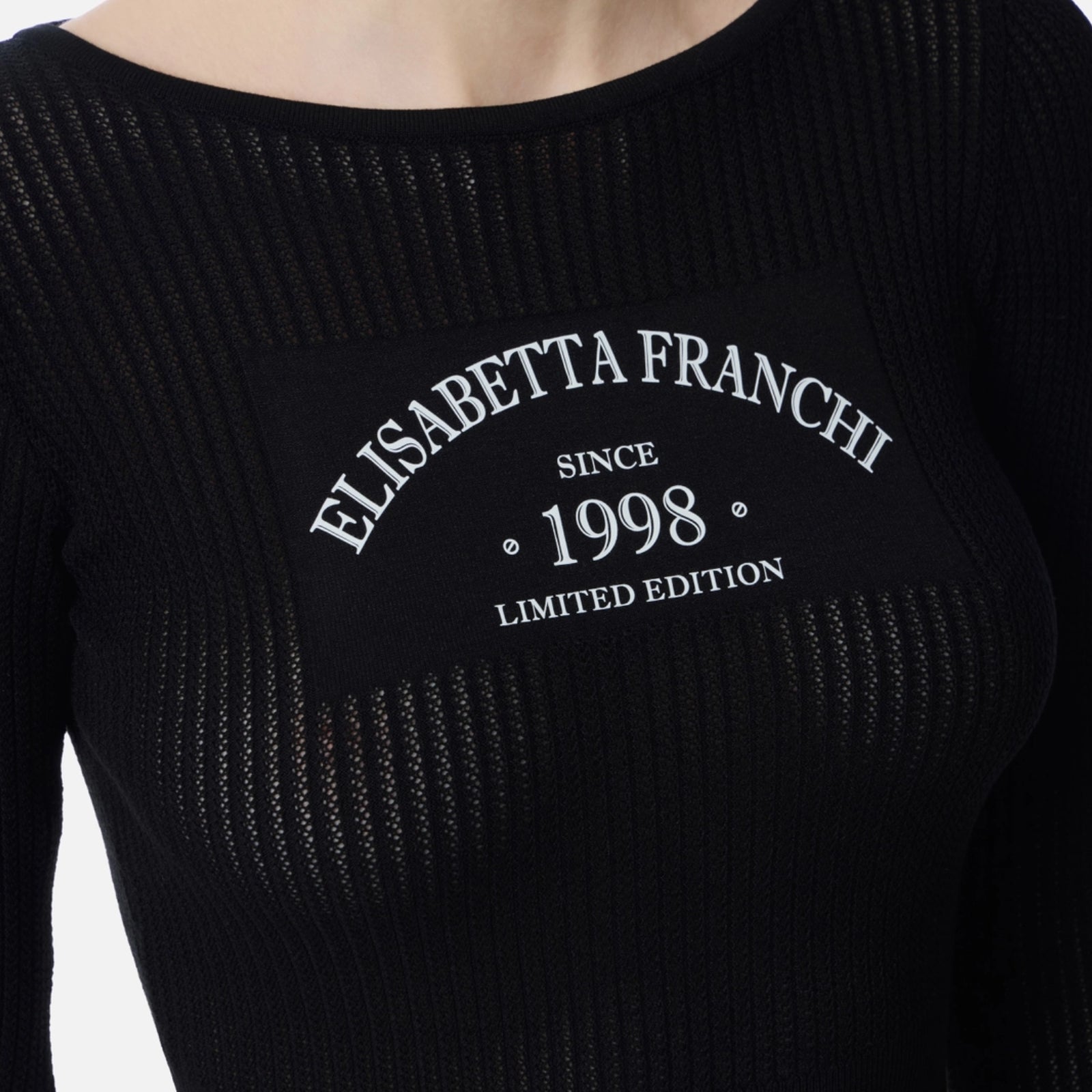 Top in maglia con logo stampato - NERO